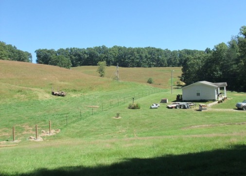 Fence going in behind the house
